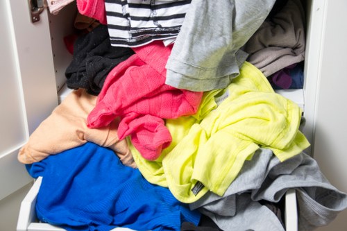 Operatives sorting and segregating rubbish during a clearance